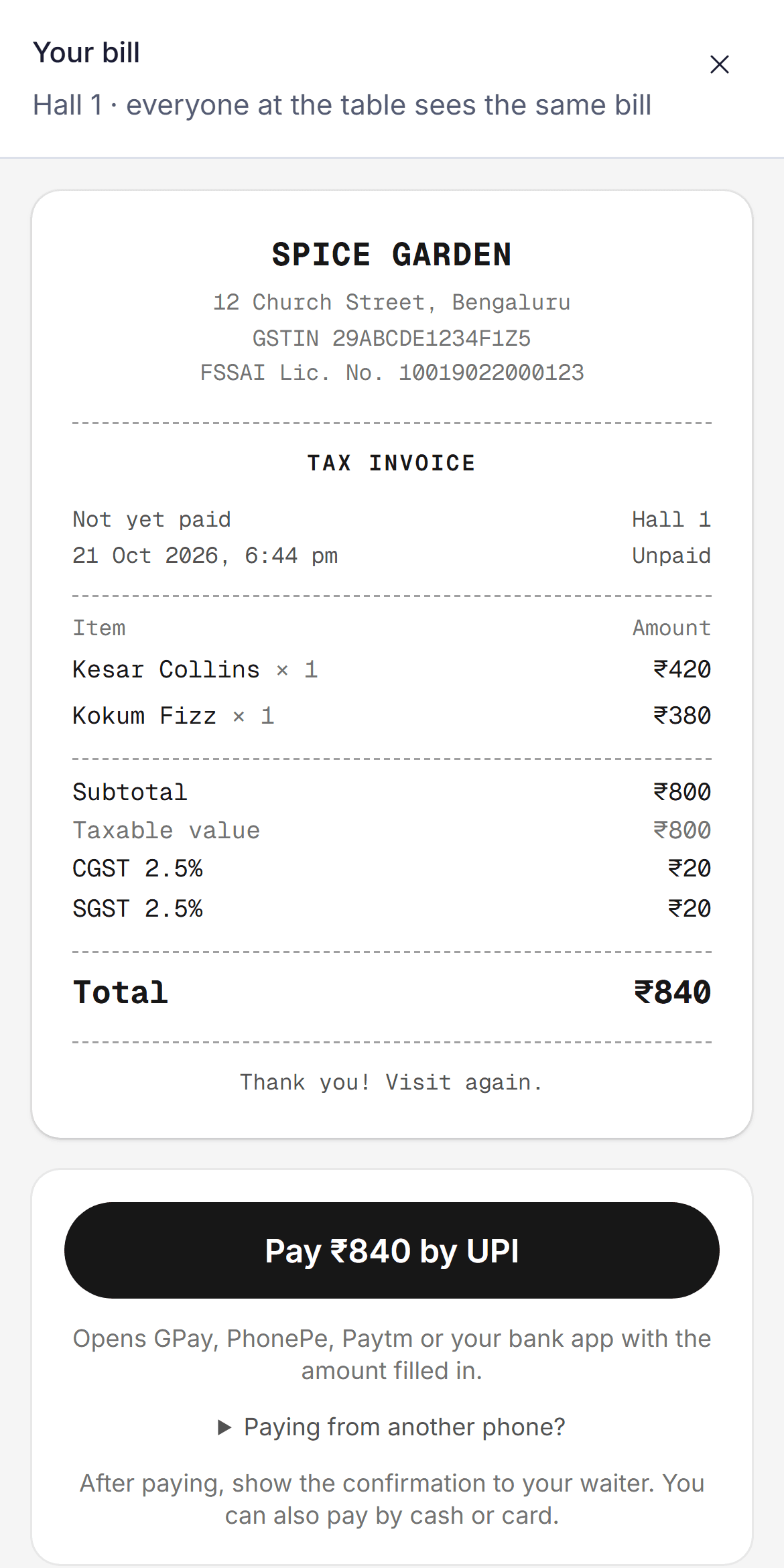 The guest's tax invoice on a phone, with GSTIN, items, CGST, SGST and the total